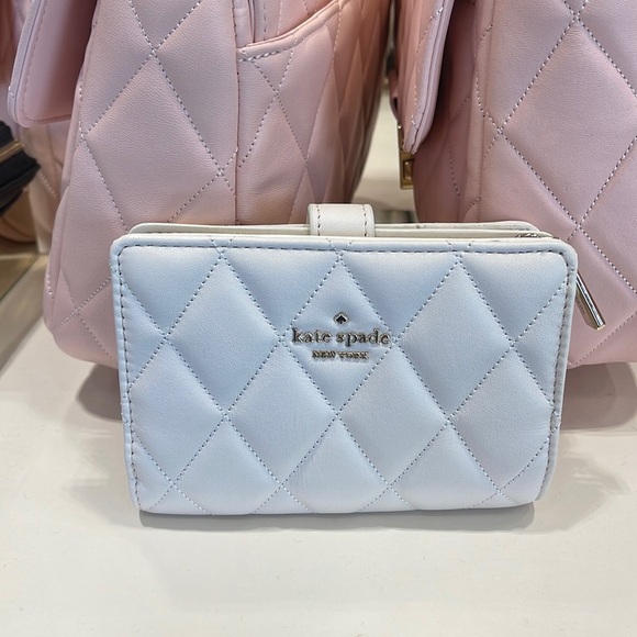 kate spade Handbags - Kate Spade Carey Medium Compartment Bifold Wallet 
COLOR: Parchment